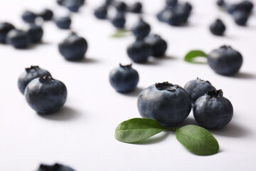 Many ripe blueberry on white background, closeup