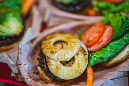 Avocado and pineapple burgers, Kua Aina Sandwich Shop, North Shore, Haleiwa town, Oahu Hawaii