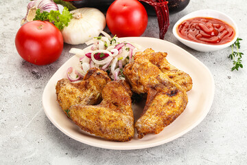 Grilled chicken wings with sauce
