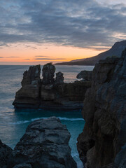 Fototapeta premium Sunrise view at Punakaiki coastline, New Zealand.