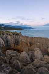 Sunrise view of pancake rocks at Punakaiki, New Zealand.