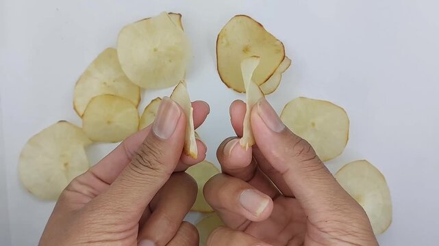 Cassava chips which are golden brown in color and have a crunchy texture are usually eaten as a snack
