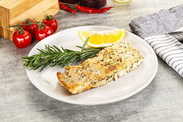 Baked salmon fish served rosemary