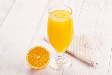 Sweet fresh orange juice in the glass