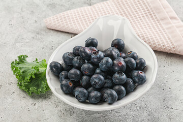 Sweet ripe blueberry on the bowl