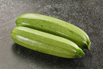 Raw green ripe zucchini vegetable
