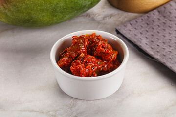 Spicy pickled raw green mango