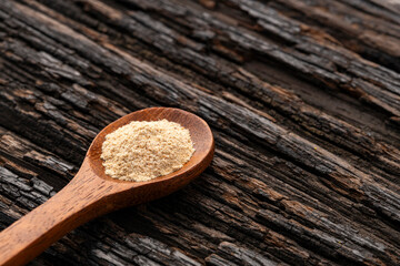 Maca root or Peruvian ginseng in the spoon - Lepidium meyenii