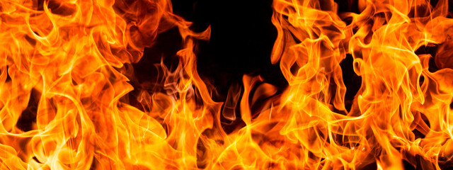 Texture of fire on black background. Hell bonfire. Texture of fire on a black background. Fire over...