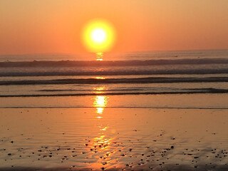 sunset in Rye, South Hampton at the ocean with reflection