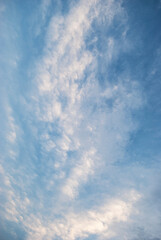 gentle white clouds in the blue sky