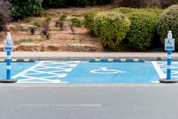 Disabled parking sign and spot on the street.