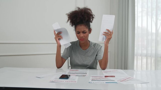 Stressed young woman has financial problems with credit card debt to pay crucial show concept of bad personal money and mortgage pay management crisis.
