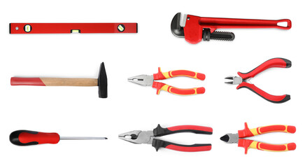 Set of different construction tools on white background, top view