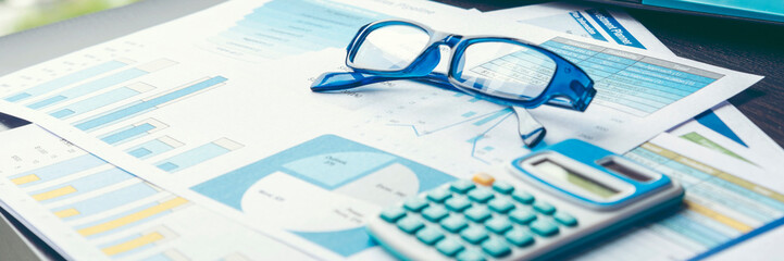 Banner Top view office desk laptop and coffee cup on wood table copy space.  Panorama tabletop notebook laptop coffee cup for officer display empty space wooden background workspace full banner design