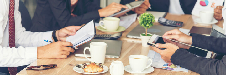 Banner Group of business people meeting in conference room. Panorama Asian businesspeople brainstorm teamwork partnership. Happy teams meeting graph chart business data meeting room with copy space