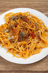 angle view spaghetti with classic bolognese sauce at vertical composition