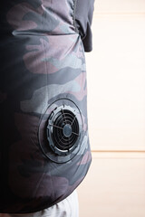 fans cooling vest at vertical composition with copy space