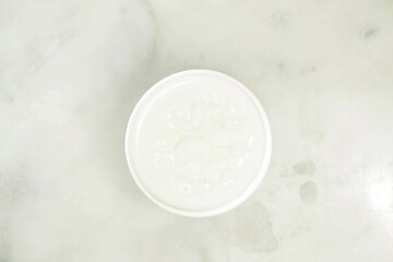 Protein Almond Tea served in cup isolated on grey background top view of asian drink