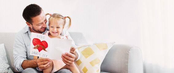 Happy Father's Day Concept. Daughter congratulating dad and giving him postcard with Love my daddy text, copy space