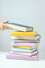 A stack of books on a light background