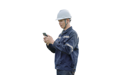 A man in a blue jacket is looking at his cell phone