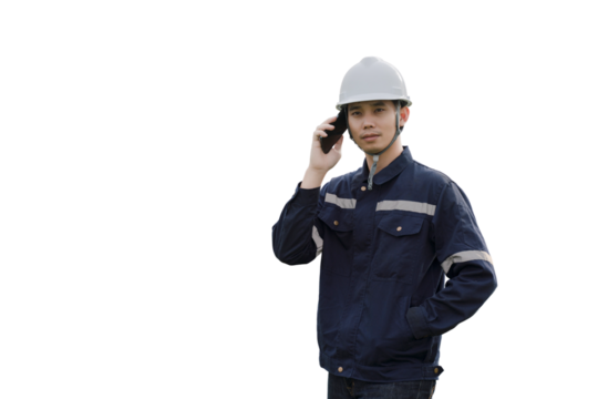 A man in a blue jacket is talking on a cell phone