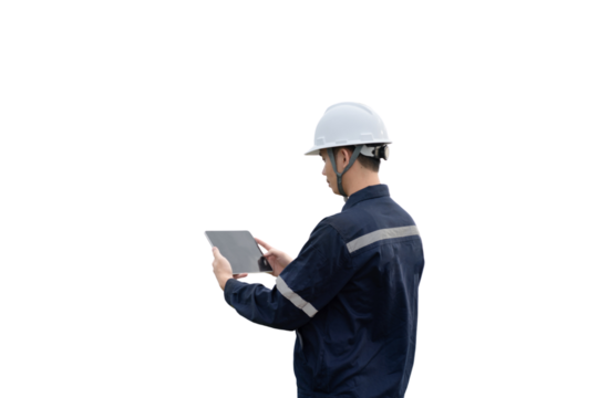 A man wearing a hard hat and a blue shirt is looking at a tablet - Powered by Adobe