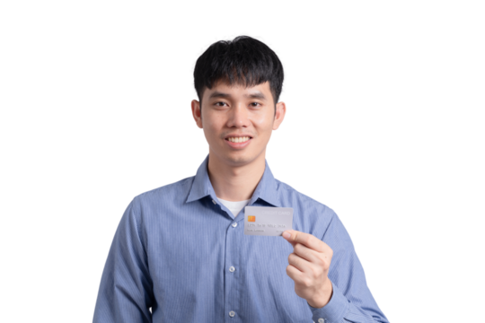 A man is holding a credit card and smiling