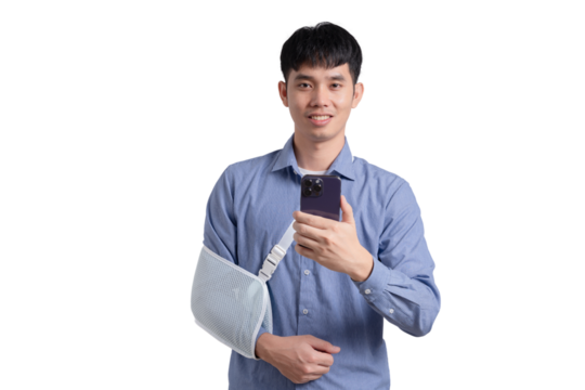 A man with a cast on his arm is holding a cell phone