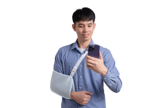 A man with a cast on his arm is taking a picture of himself with his cell phone