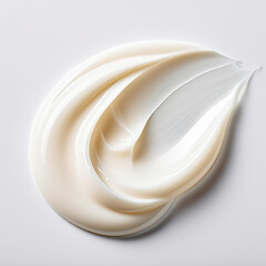 a creamy substance smeared on a white background