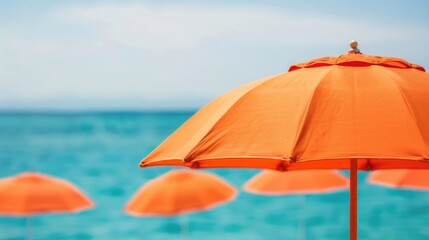 Vibrant orange umbrellas dotting a sun drenched pool deck creating a shaded oasis against the backdrop of a serene deep blue ocean and cloudless sky  This peaceful