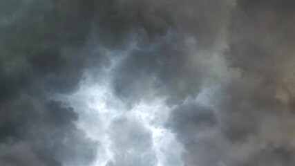 storm clouds, ominous rain clouds and lightening.