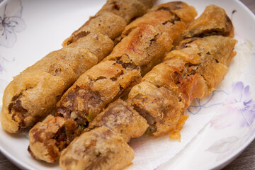 Crispy and delicious fried spring rolls close-up