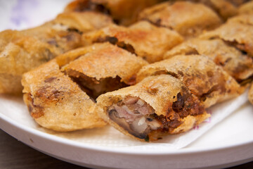 Crispy and delicious fried spring rolls close-up