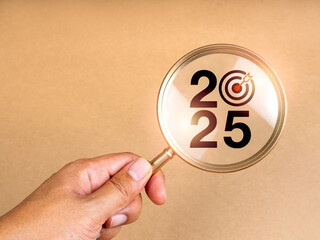 Happy new year 2025 with business trends and market concept. 2025 calendar number with target icon...