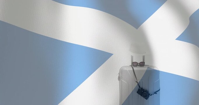 Travel essentials animation on Scottish flag background