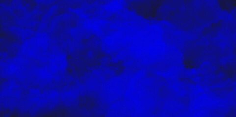 Abstract blue watercolor background texture of chaotically mixing puffs of blue smoke on a dark background, beautiful abstract blue cloud on dark black background and colorful texture pattern.