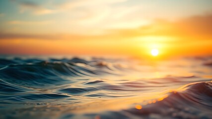 Fototapeta premium Sunset over rolling ocean waves with warm gradient sky