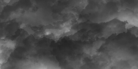 Fluffy stormy clouds in black and white mode storm thunder and tumble across the sky over beautiful natural white clouds, abstract dramatic sky before a storm of gray color black cloud smoke. 