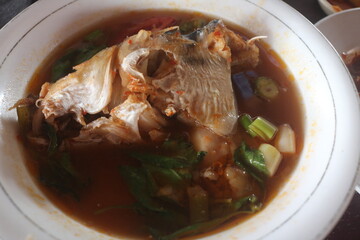 traditional Indonesian Palembang cuisine. Pindang Patin. snakehead fish pindang. Pindang Toman. pindang baung. smoked fish. Great dish for lunch and dinner served with rice