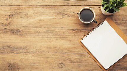 A peaceful workspace featuring a blank notebook, coffee cup, and potted plant on rustic wooden table, perfect for creativity.