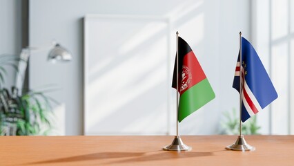 FLAGS OF AFGHANISTAN AND CAPE VERDE ON TABLE