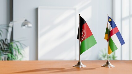 FLAGS OF AFGHANISTAN AND CENTRAL AFRICAN REPUBLIC ON TABLE