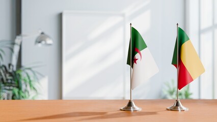 FLAGS OF ALGERIA AND BENIN ON TABLE