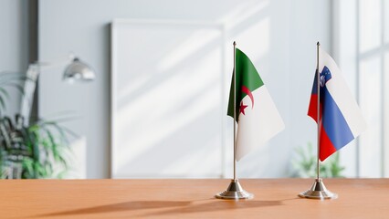 FLAGS OF ALGERIA AND SLOVENIA ON TABLE