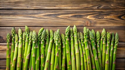 Green asparagus stalks arranged neatly on a wooden table, fresh, organic, vegetable, food, farm, natural, healthy