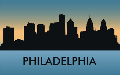 Fototapeta premium Philadelphia. The city skyline. Silhouettes of buildings. The sunset of the day. Vector on a blue background
