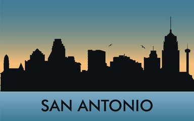 Obraz premium San Antonio. The city skyline. Silhouettes of buildings. The sunset of the day. Vector on a blue background 